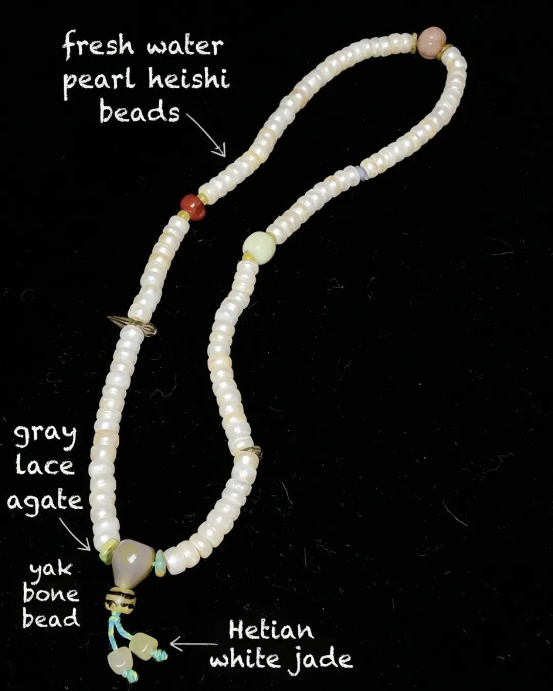 Material map for The Devotion #07 — labelled fresh water pearl heishi beads, gray lace agate, yak bone bead, and Hetian white jade used in the hand-knotted 108 mala.
