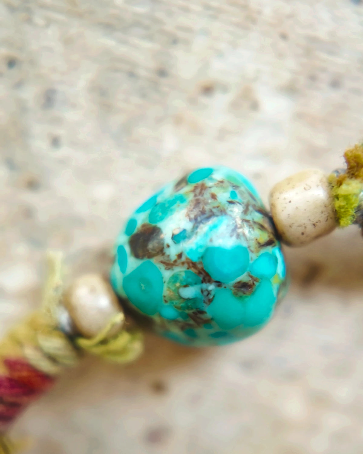 The Duet #48: Close view of a turquoise bead and its visible matrix