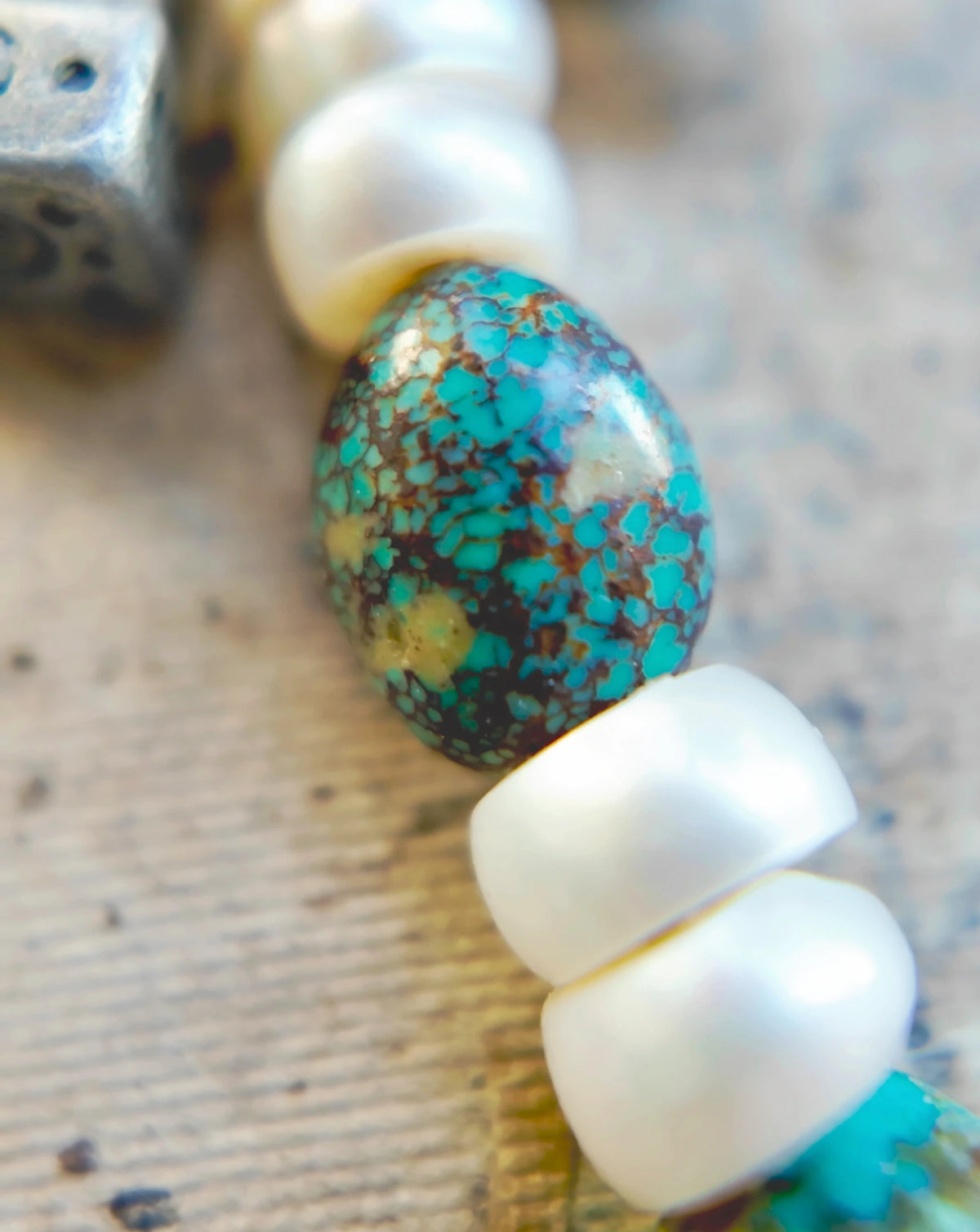 The Littoral #51: Natural turquoise bead with brown matrix between white freshwater pearls