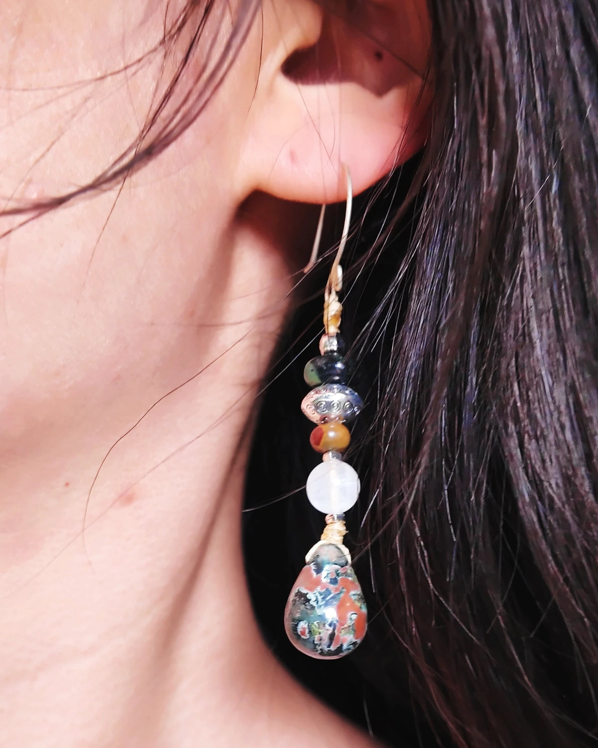 The Marissa #60: Single earring worn in daylight, showing the full drop