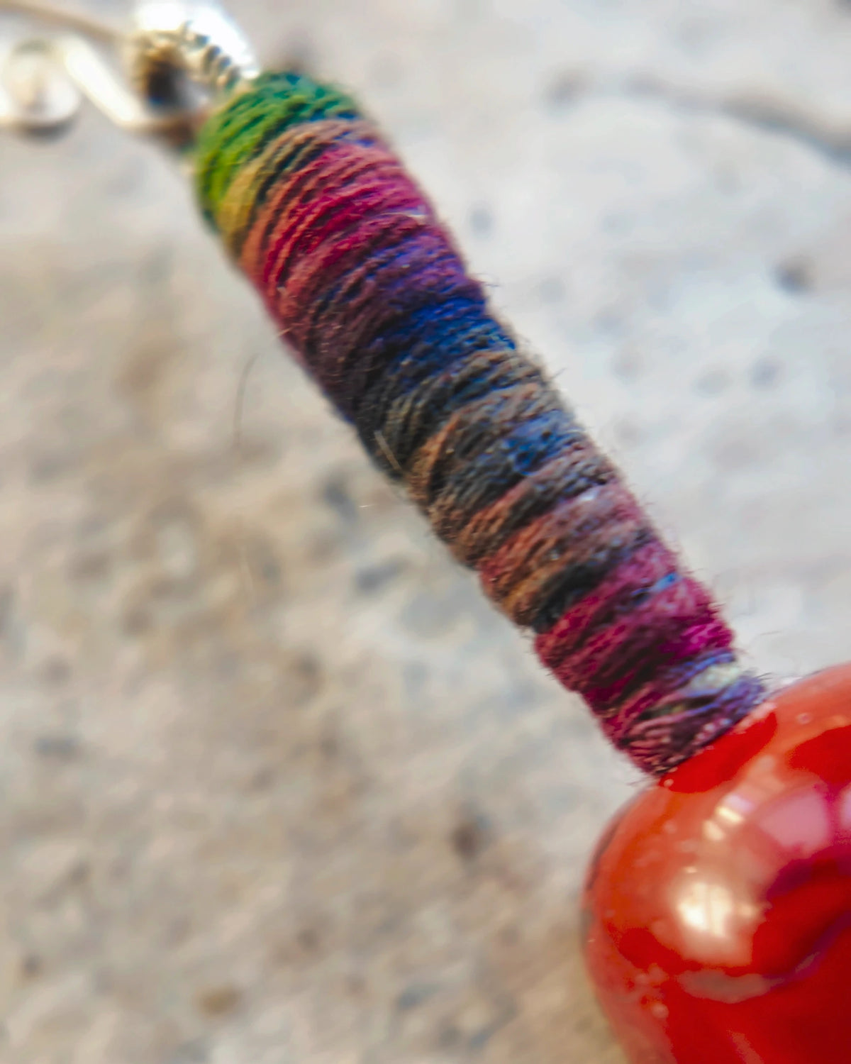 The Redthread #52: Plant-dyed multicolored cotton cord wrapped around the upper drop