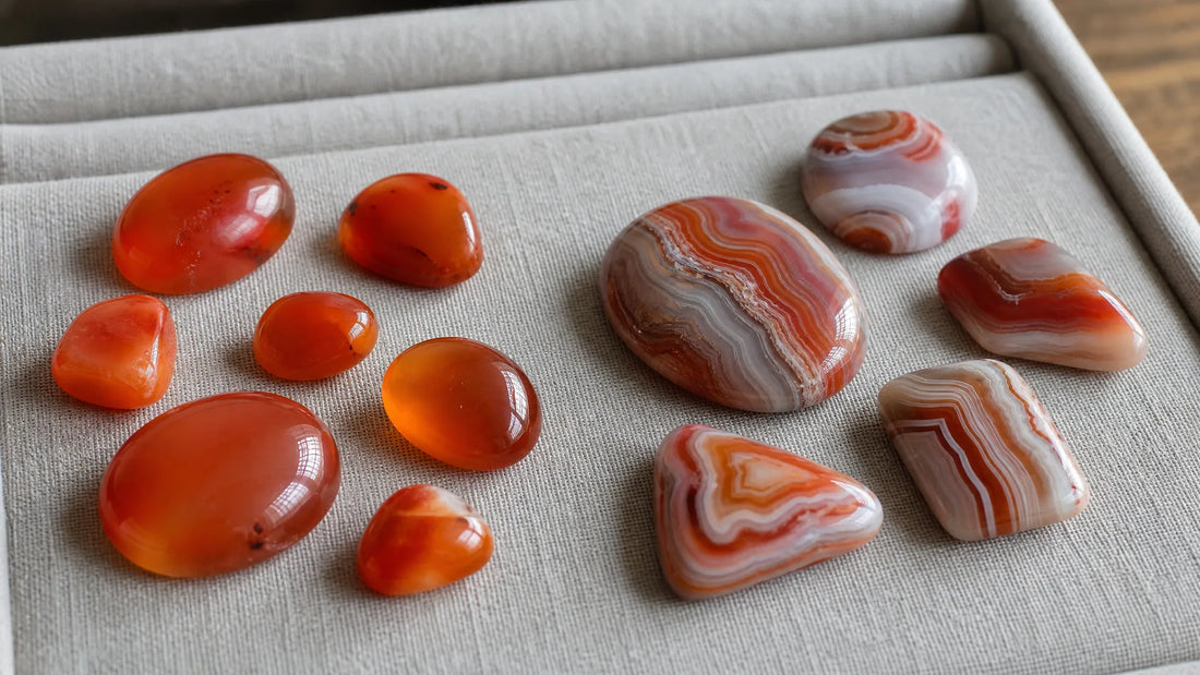 Carnelian and Red Agate comparison on a linen jeweler's tray