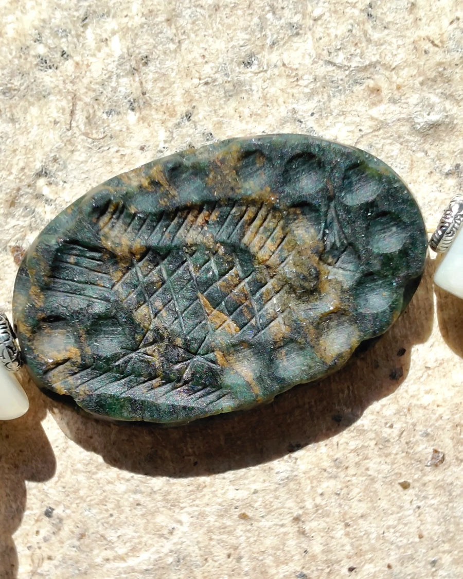 Interlaced carving on the green Verdite focal of The Earthscript #57 bracelet