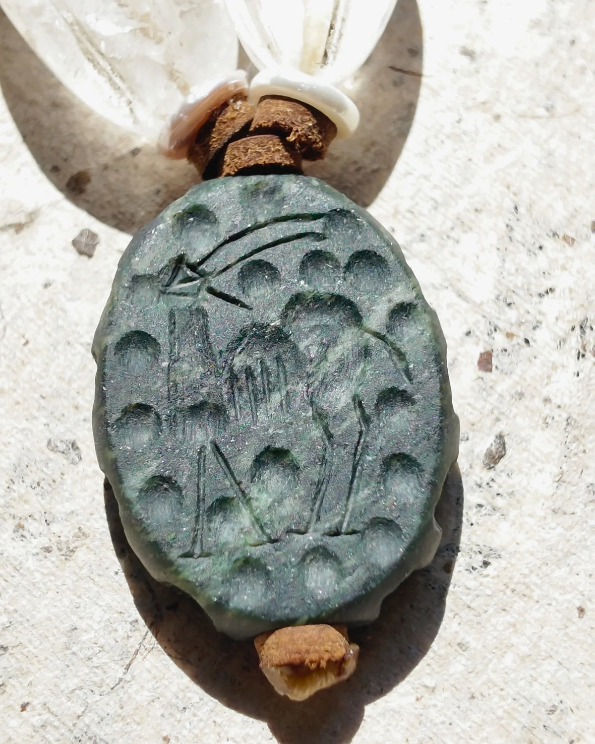 Curved incised marks on the green Jasper pendant in The Waymark #49 necklace