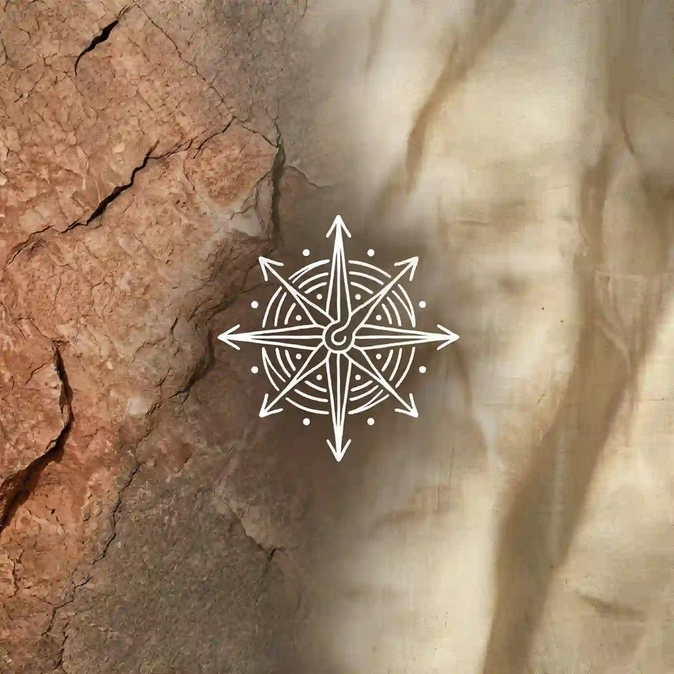 Hand-drawn spiritual compass symbol on stone texture, representing guidance for your journey to find your intention.