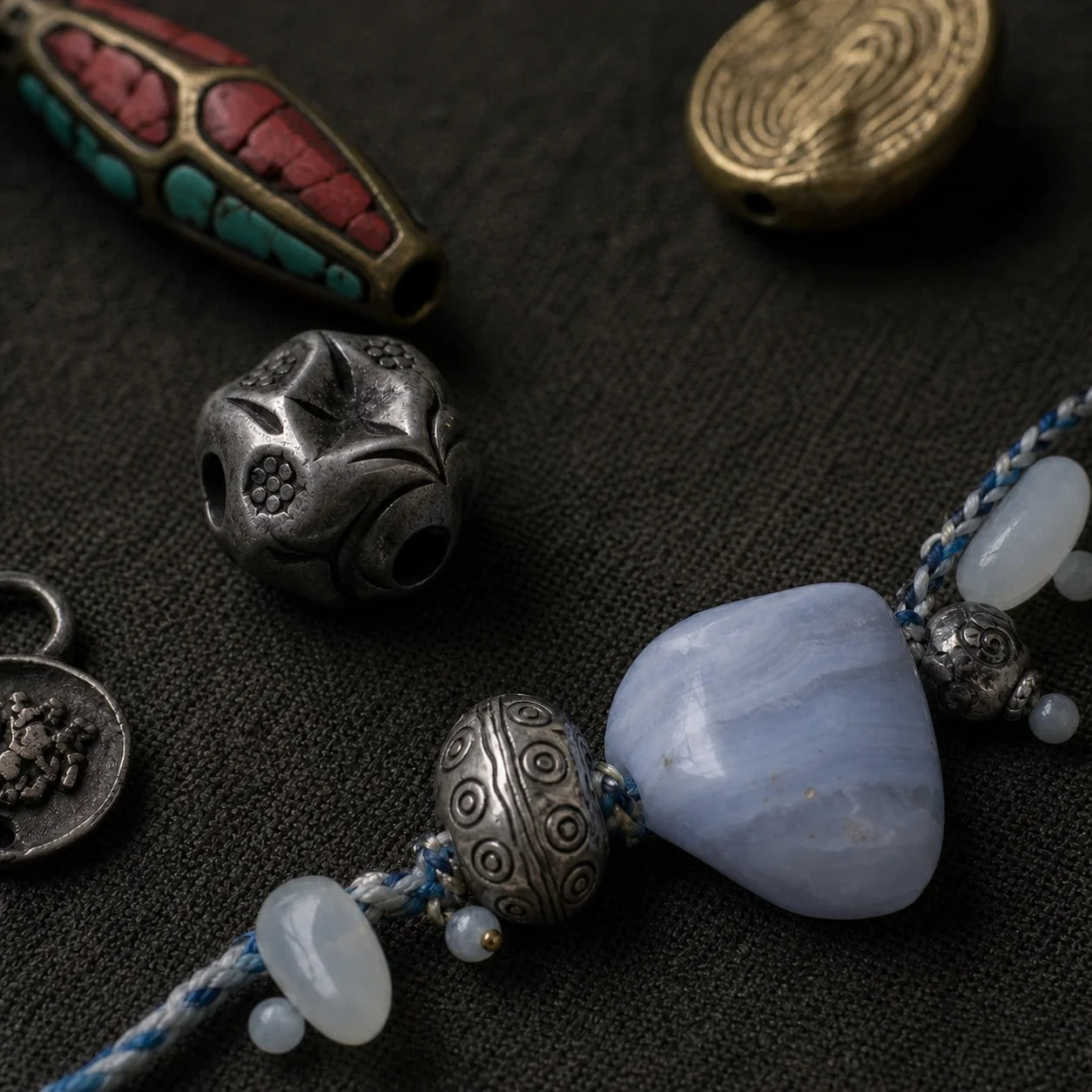 Oxidized Metal collection by à la luck — patina silver and aged-metal details in finished talisman jewelry