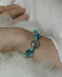 The Cultivator #18 moss agate abundance bracelet by à la luck - worn on the wrist showing faceted moss agate and dyed magnesite accents in scale