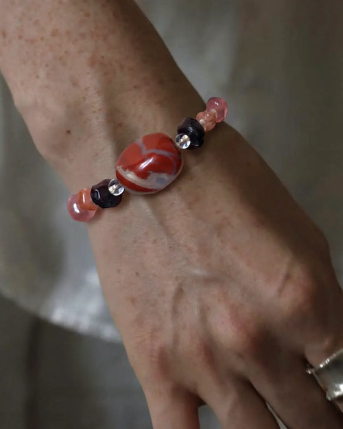 The Hearth #25 bracelet, hero lifestyle shot featuring african red jasper, approx 20mm