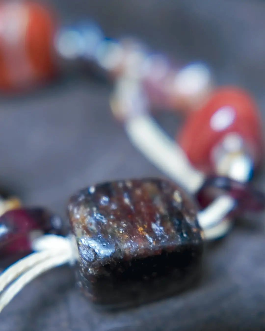 The Hearth #25 bracelet, detail view 6 — showing bead-knot construction and accent stones