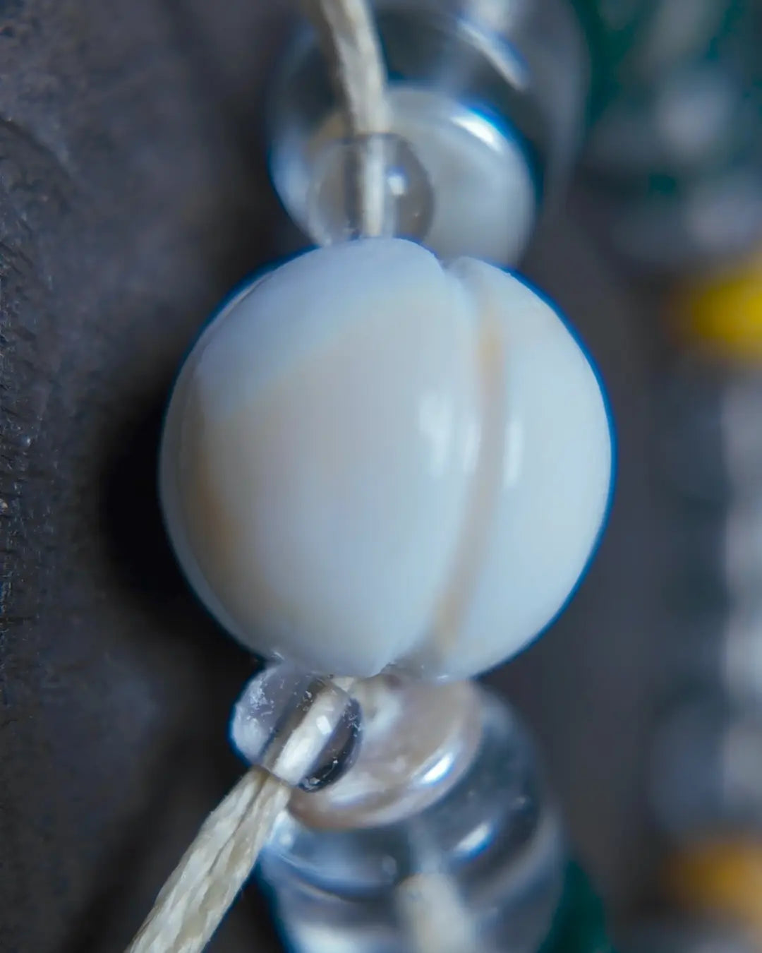 The Vow #26 bracelet, detail view 4 — showing bead-knot construction and accent stones