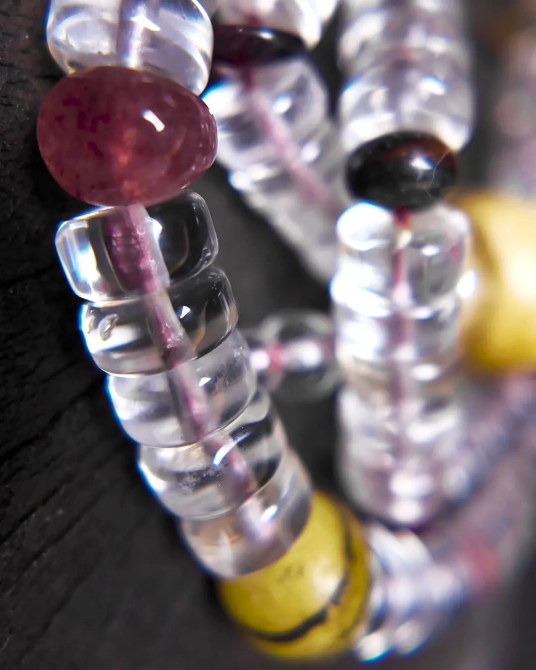The Adept #27 necklace, detail view 8 — showing bead-knot construction and accent stones