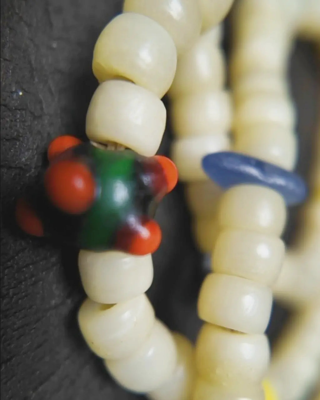 The Veil #28 necklace, detail view 10 — showing bead-knot construction and accent stones