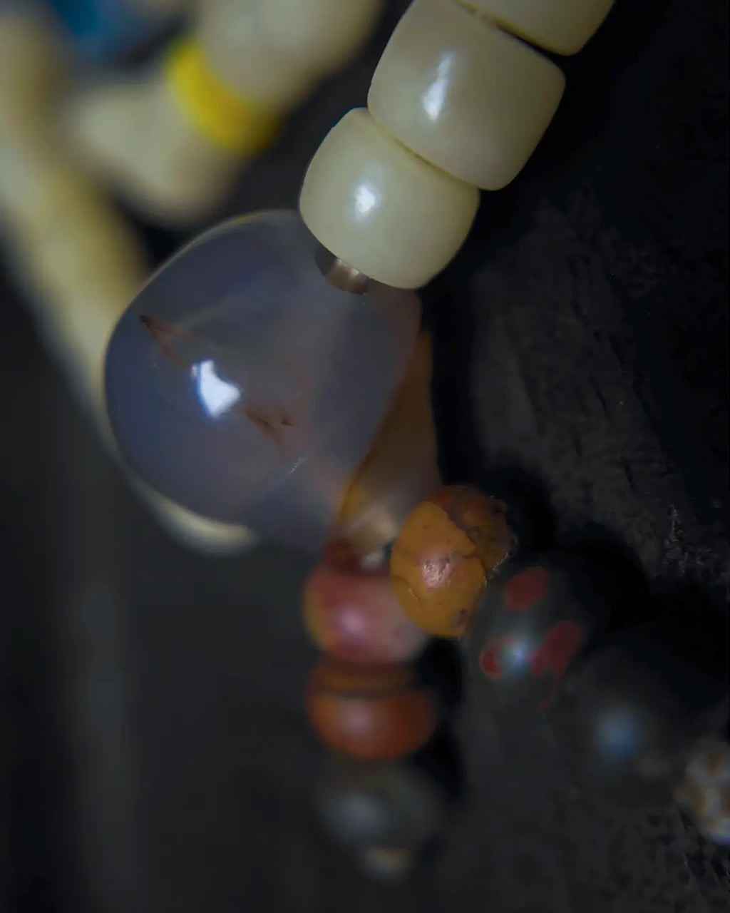 The Veil #28 necklace, detail view 11 — showing bead-knot construction and accent stones