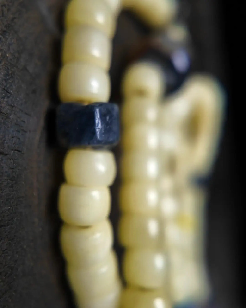 The Veil #28 necklace, detail view 12 — showing bead-knot construction and accent stones