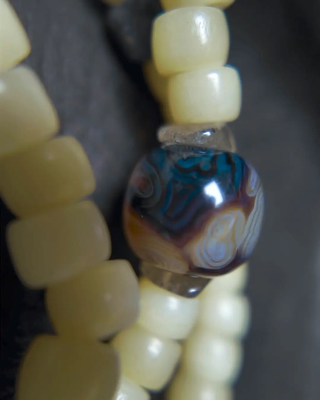 The Veil #28 necklace, detail view 6 — showing bead-knot construction and accent stones