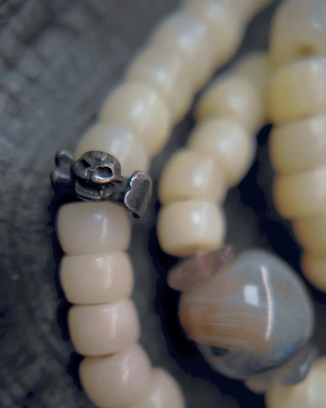 The Veil #28 necklace, detail view 8 — showing bead-knot construction and accent stones