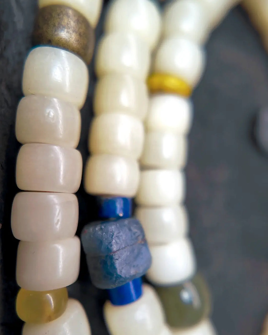 The Spark #29 necklace, detail view 12 — showing bead-knot construction and accent stones