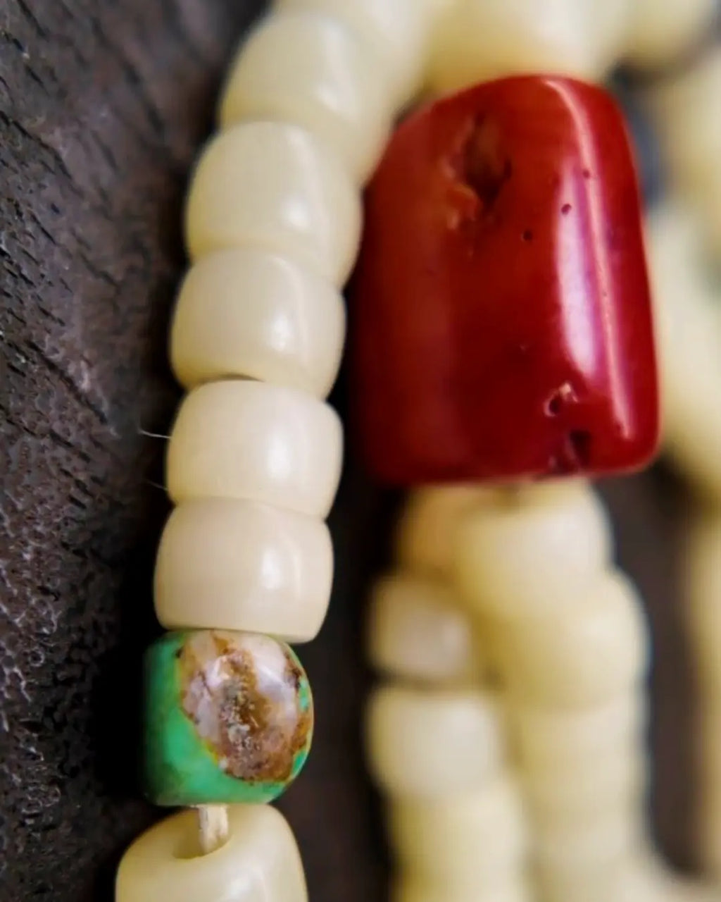 The Spark #29 necklace, detail view 6 — showing bead-knot construction and accent stones