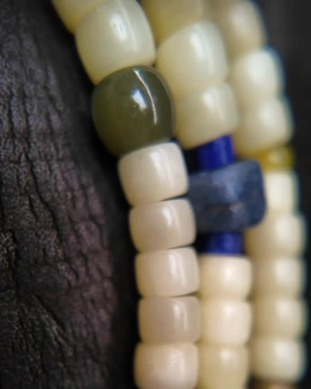 The Spark #29 necklace, detail view 8 — showing bead-knot construction and accent stones