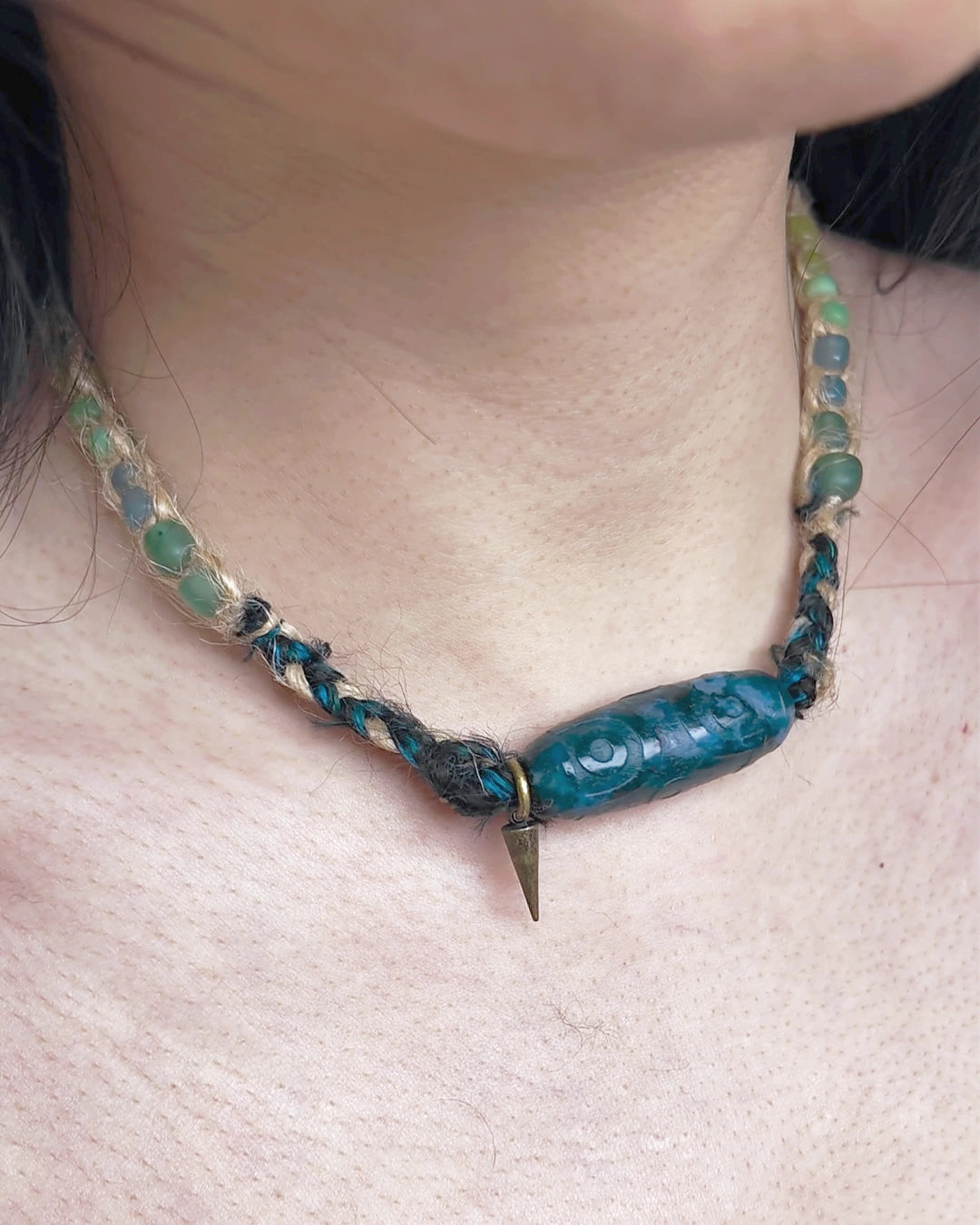 Side view of The Axis #39 fixed 41 cm moss agate choker worn