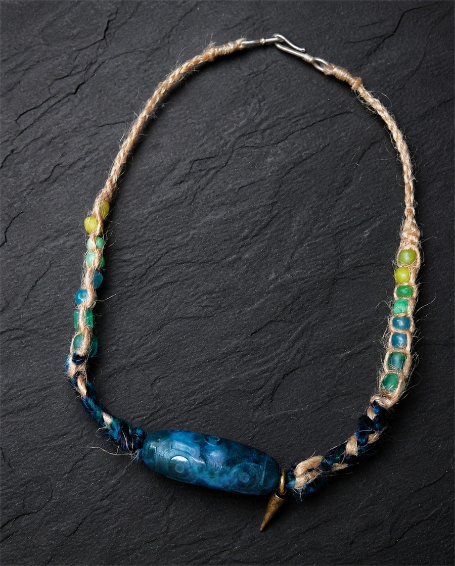 Full view of The Axis #39 moss agate hemp and banana-silk choker on charcoal slate