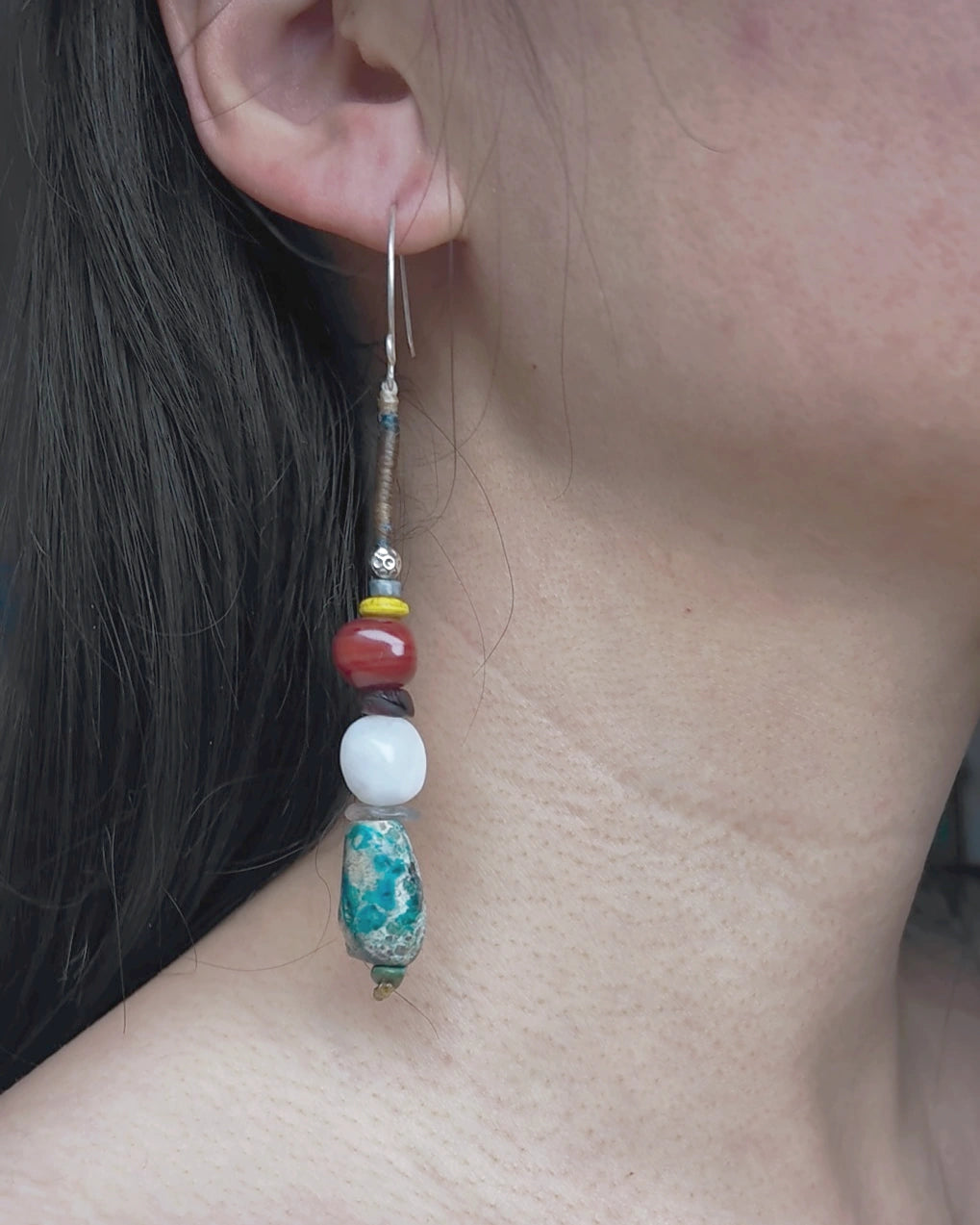 The 104 mm long earring from The Counterpoint #38 worn at the ear