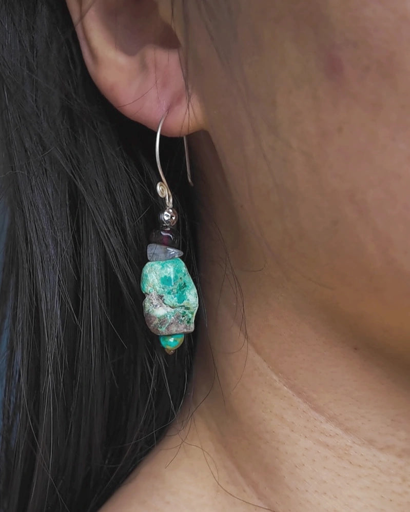 The 56.5 mm short earring from The Counterpoint #38 worn at the ear