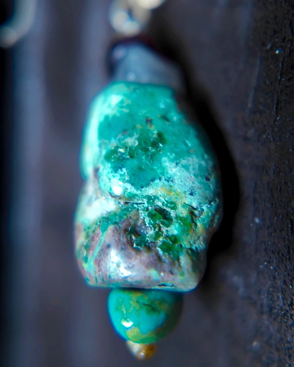Macro detail of the short untreated raw turquoise focal and dyed magnesite finish