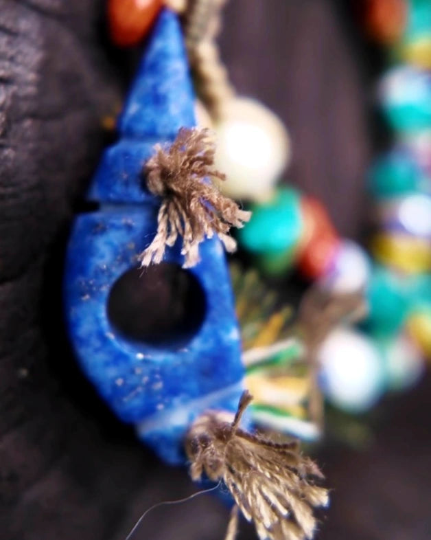 Macro view of the 36.5 x 12 mm Afghan-carved lapis focal in The Gatherer #37