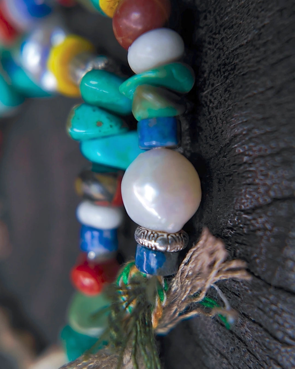 Detail of freshwater pearl, dyed magnesite, lapis and antiqued metal beads in The Gatherer #37