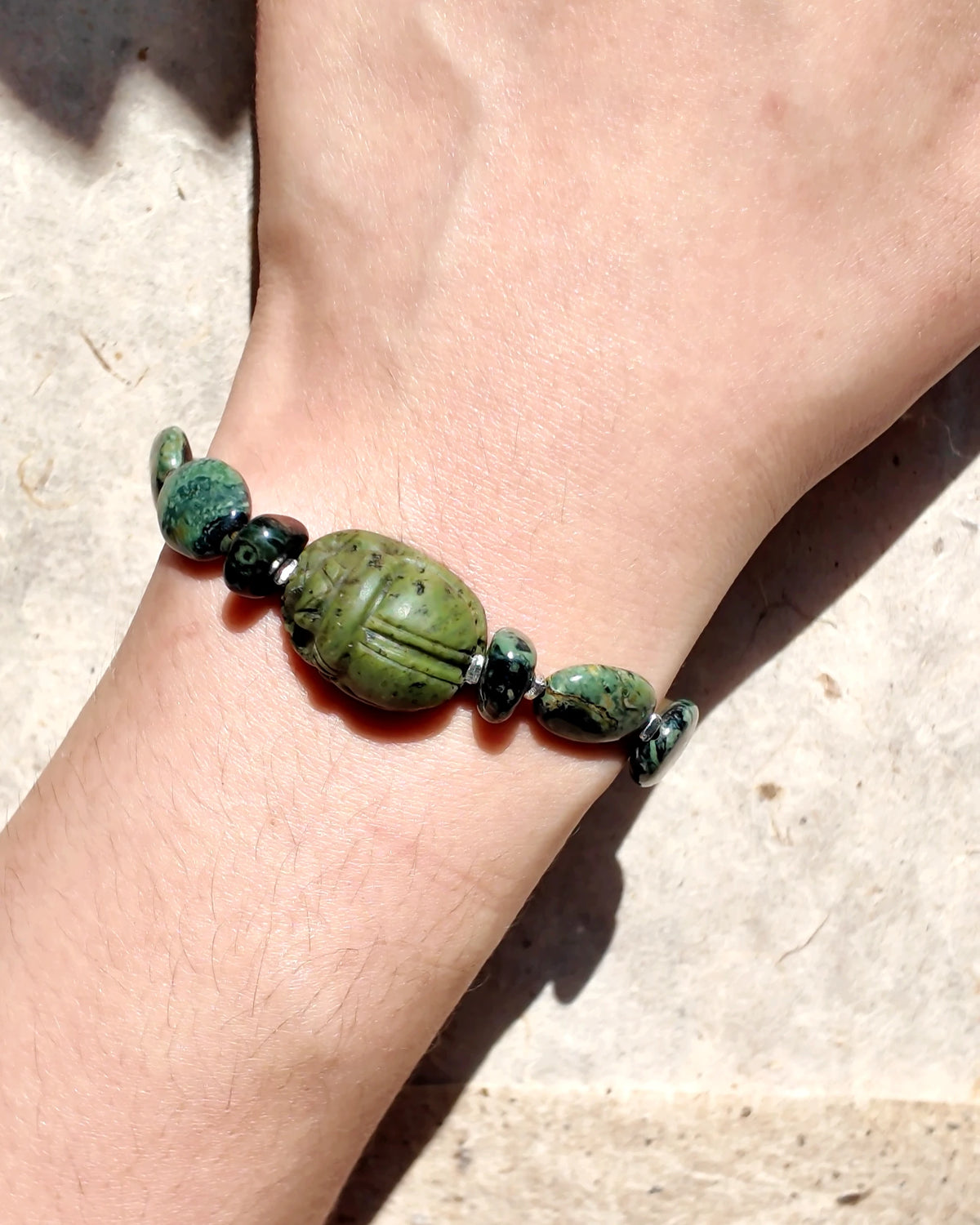 The Greenkeeper #58: Bracelet worn with the scarab reverse facing up