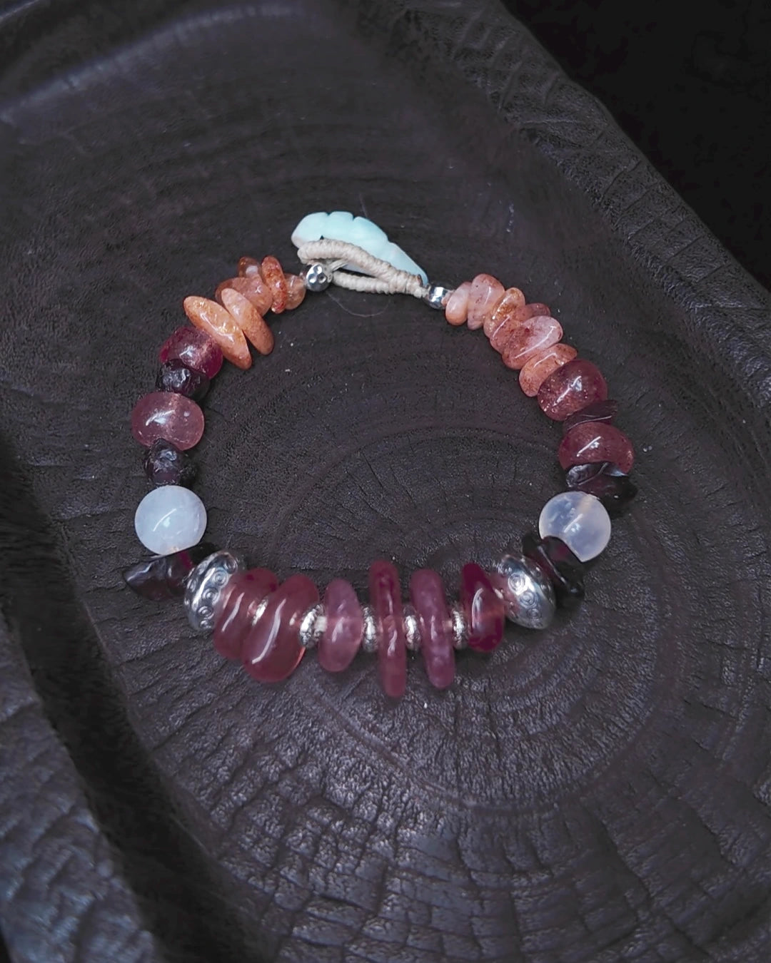 Full view of The Kindling #34 with carved white jasper closure and antiqued metal accents