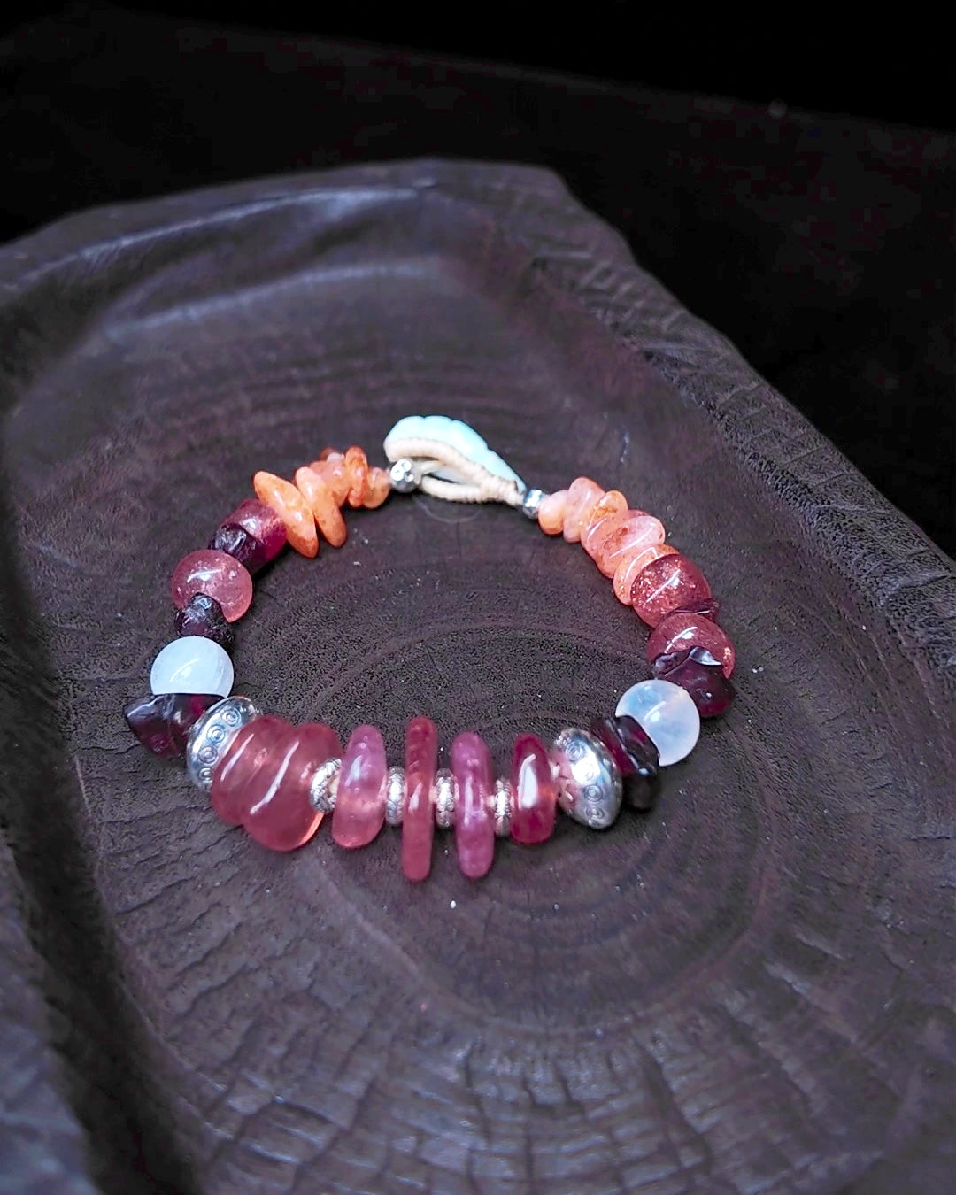 The Kindling #34 strawberry quartz bracelet with sunstone, moonstone, garnet and waxed thread