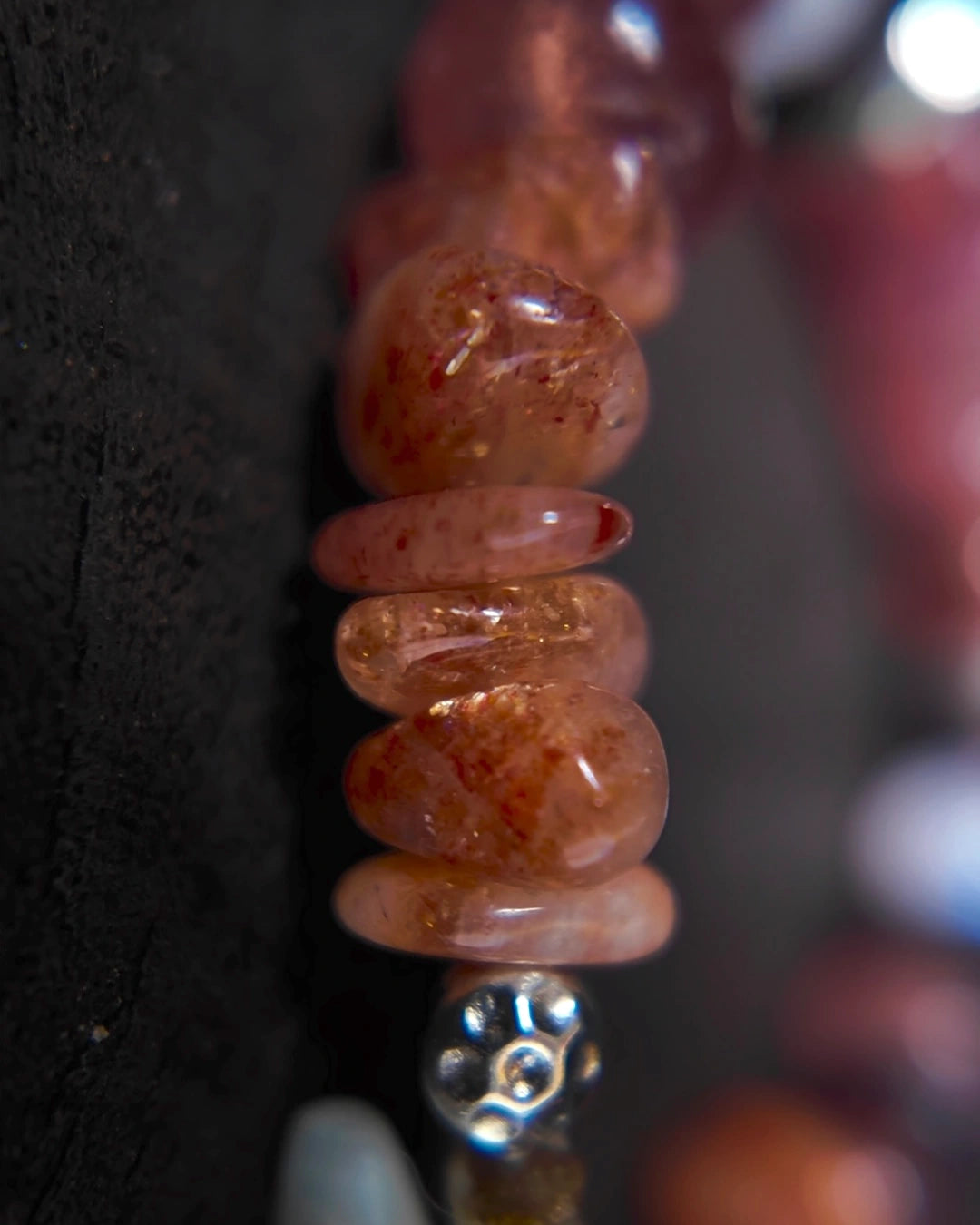Macro detail of sunstone beads in The Kindling #34 bracelet