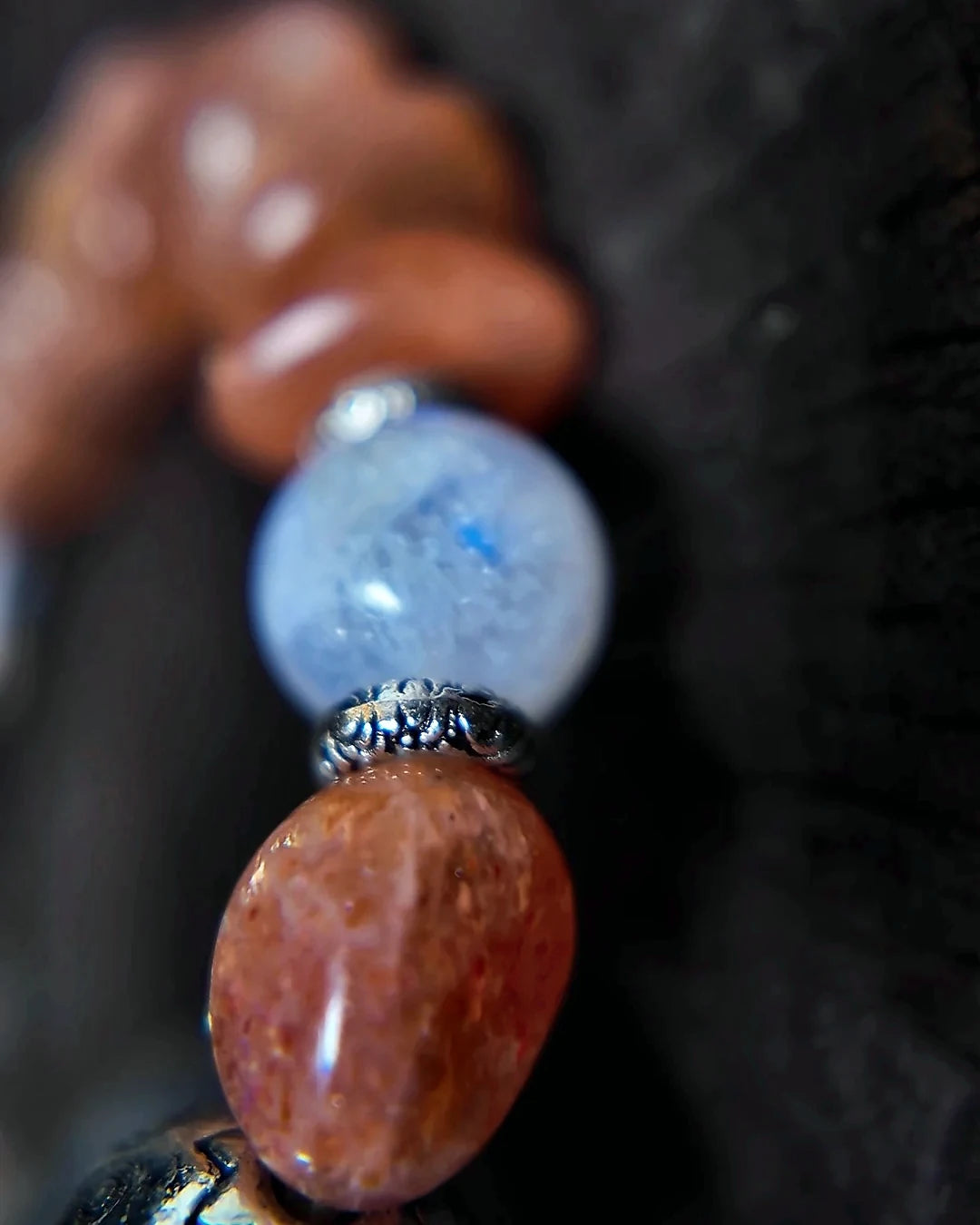 Close detail of blue moonstone and sunstone beads on The Lucent #35