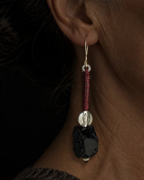 The Nightglass #53: Black obsidian earring worn in profile with dark clothing