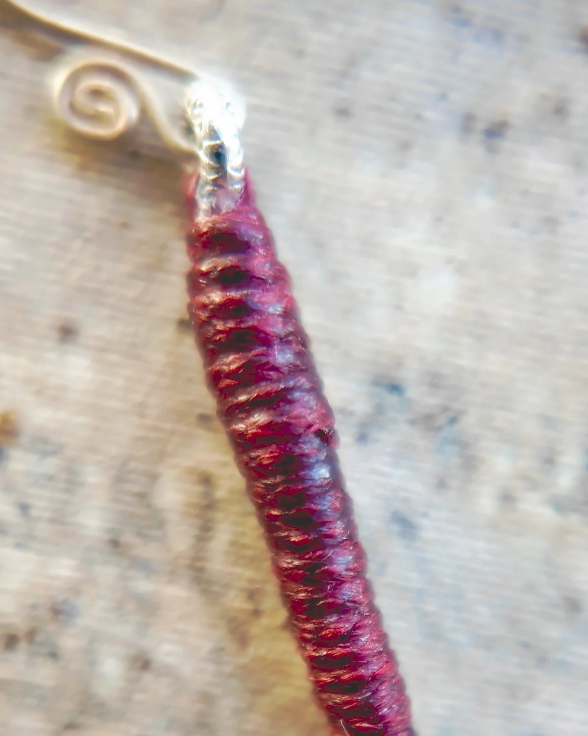The Nightglass #53: Burgundy waxed-thread wrapping below the ear hook