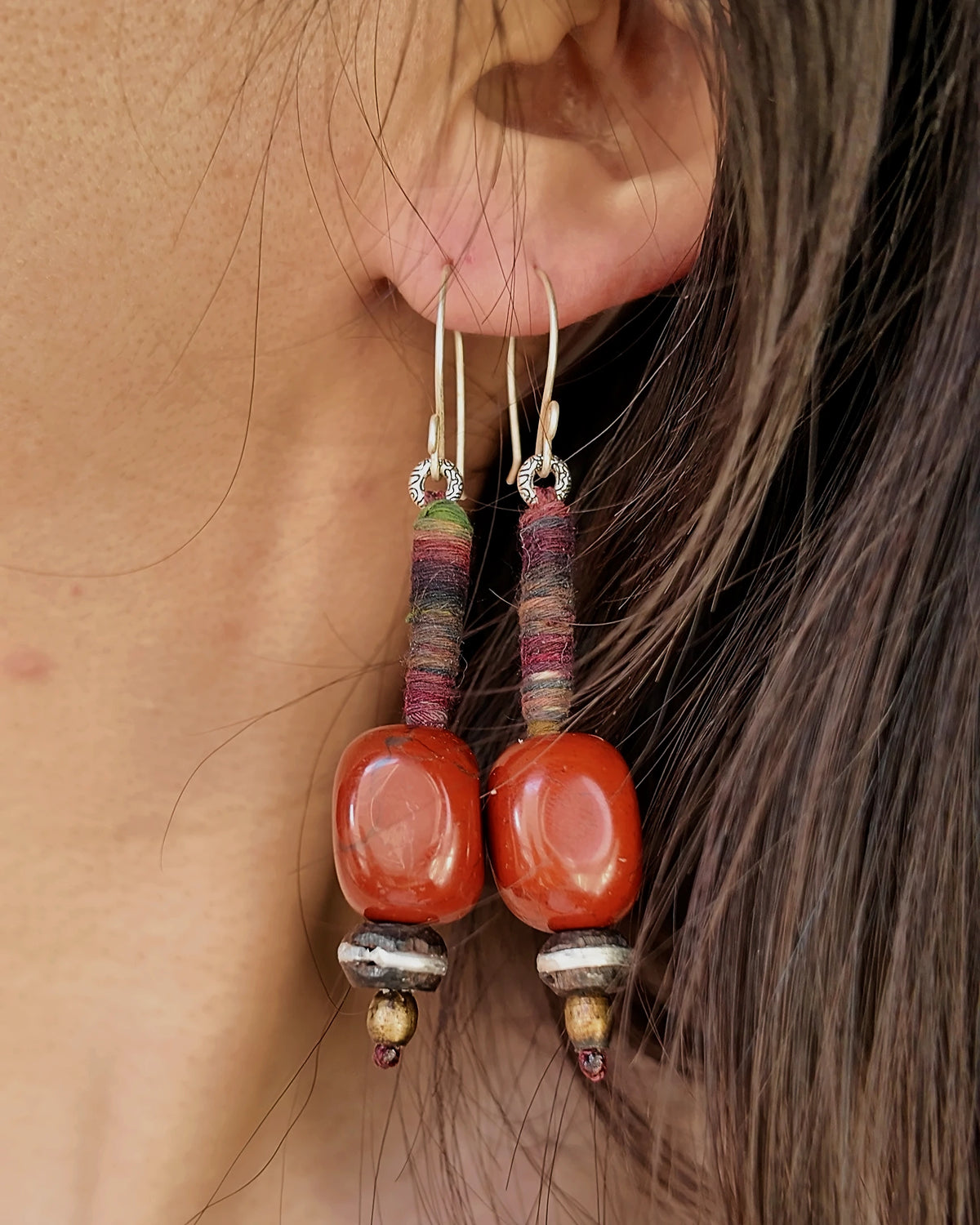 The Redthread #52: Both earrings shown together to compare the stone shapes and wrapping