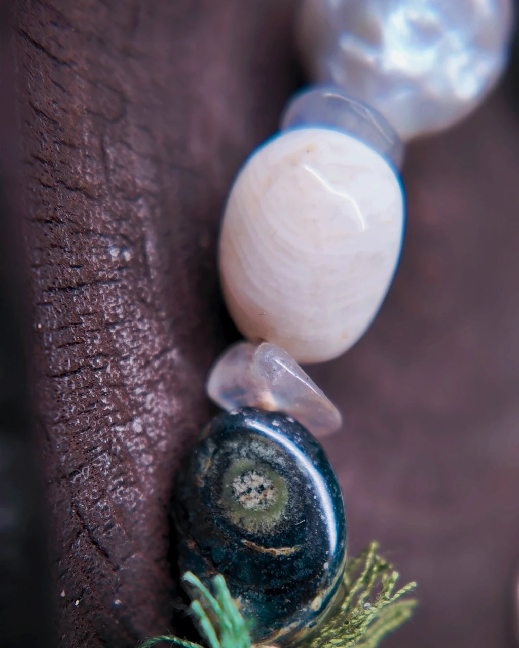 Macro view of Kambaba jasper, blue moonstone and labradorite beads on The Threshold #36