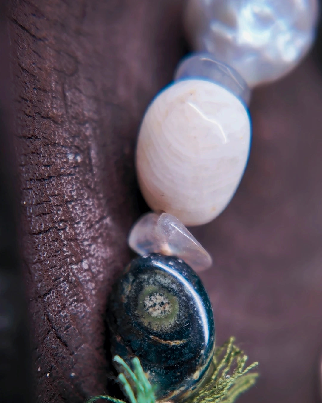 Macro view of Kambaba jasper, blue moonstone and labradorite beads on The Threshold #36