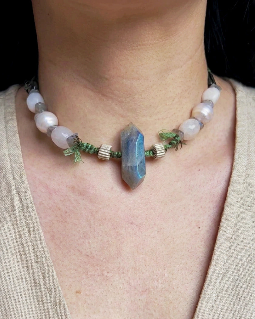The Threshold #36 choker worn at the base of the neck with its labradorite focal centered