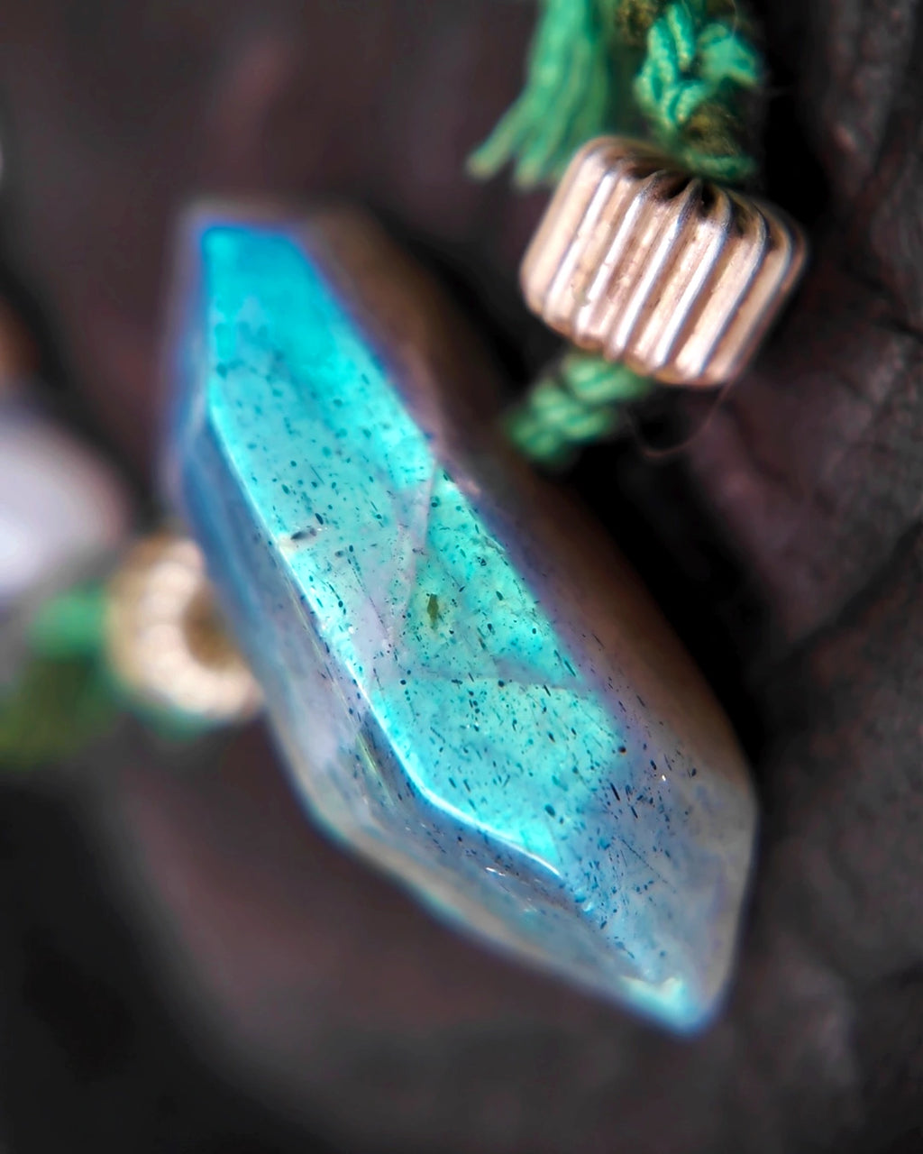 37.5 mm labradorite focal showing vivid blue flash on The Threshold #36 choker